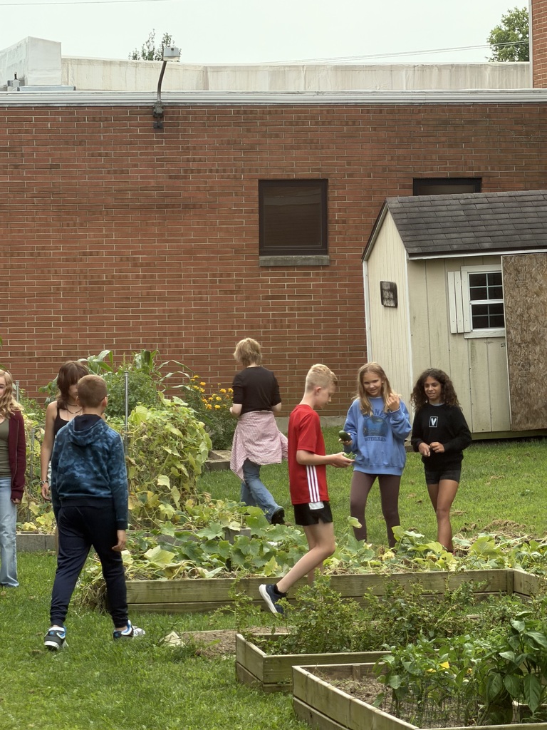TMS Garden Club inspects the garden. 
