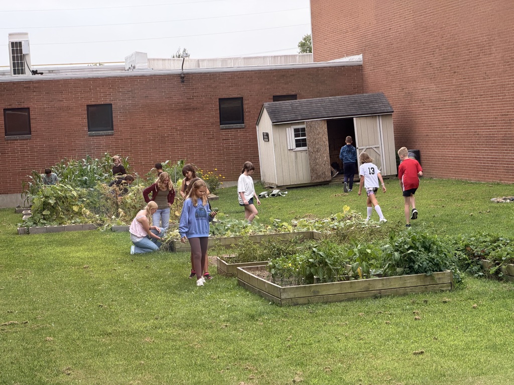 TMS Garden Club inspects the garden. 