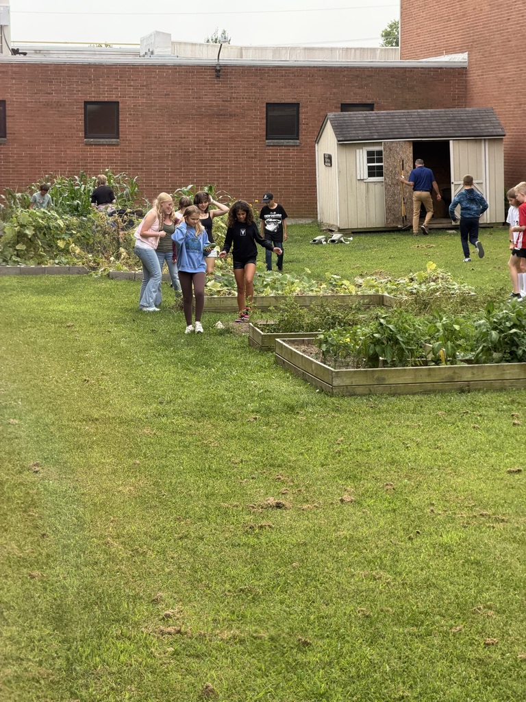 TMS Garden Club inspects the garden. 
