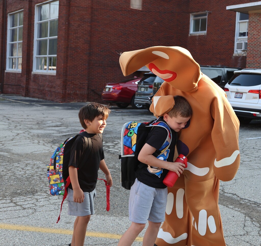 Gingerbread man interacts with a Broadway student.