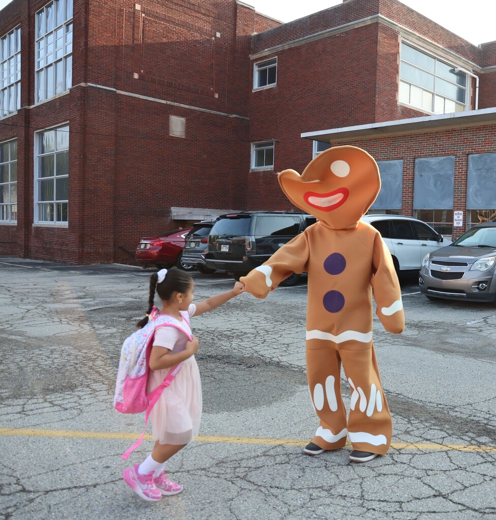 Gingerbread man interacts with a Broadway student.