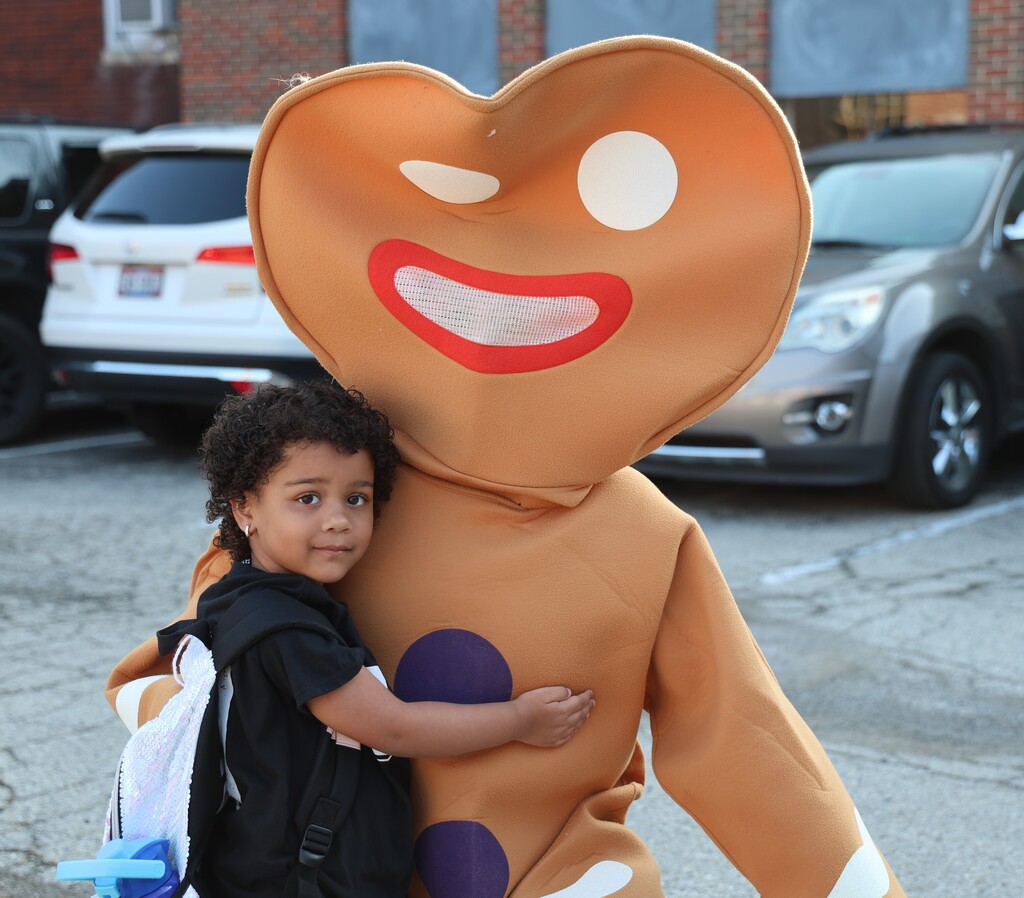 Gingerbread man interacts with a Broadway student.