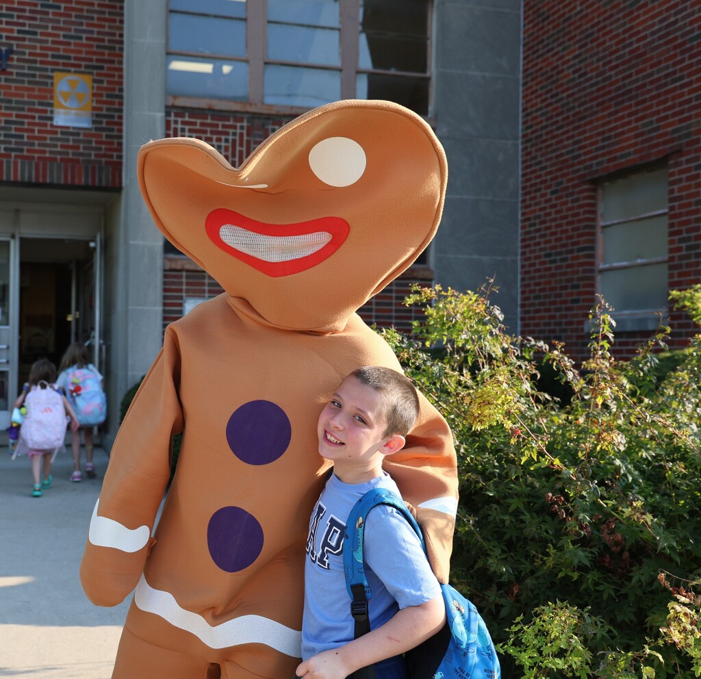 Gingerbread man interacts with a Broadway student.