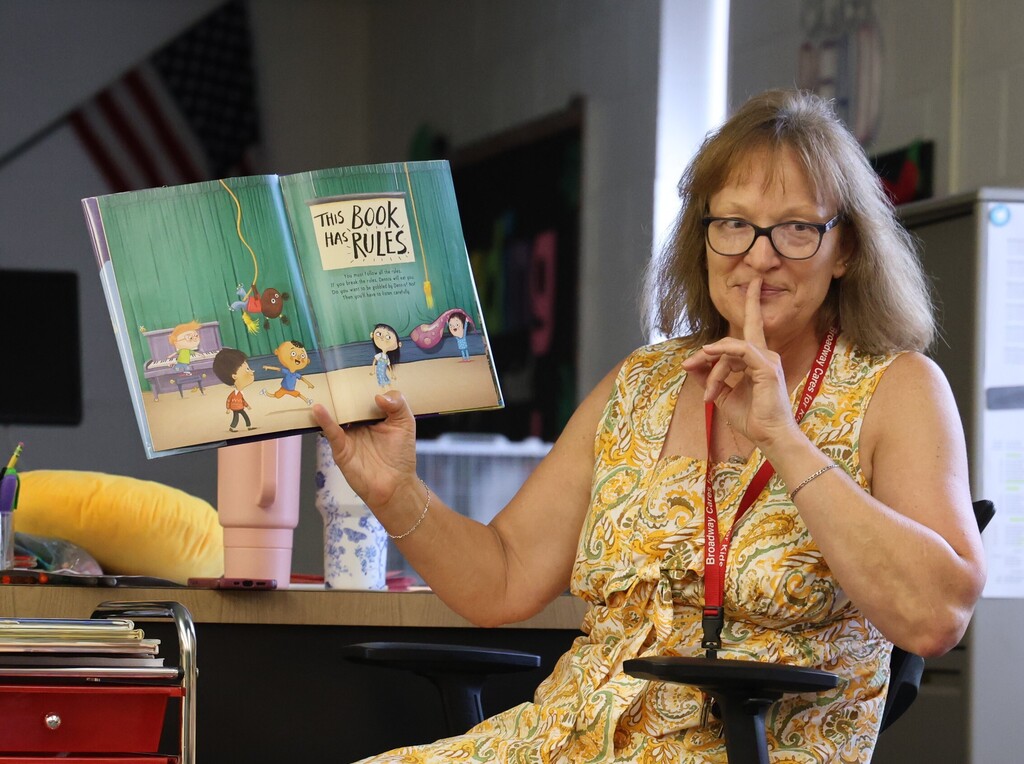 Mrs. Woltz gets into the role for the book she is reading.  