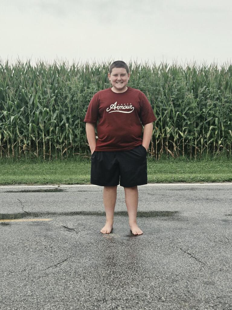 A student is ready for the first day of school.