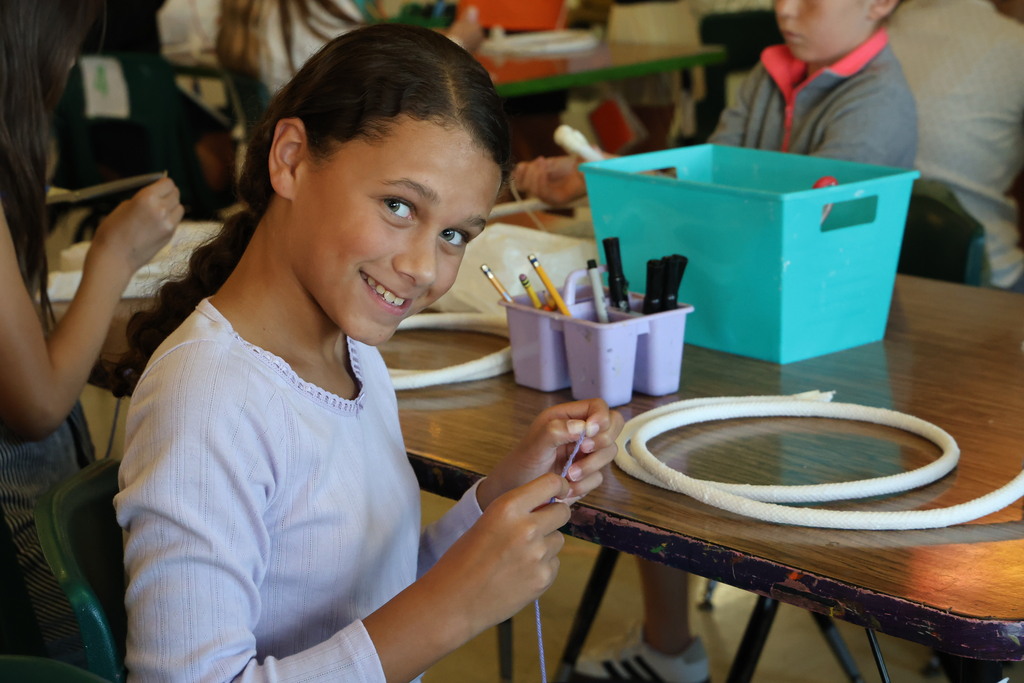 L.T. Ball fifth graders are learning how to weave a basket.  