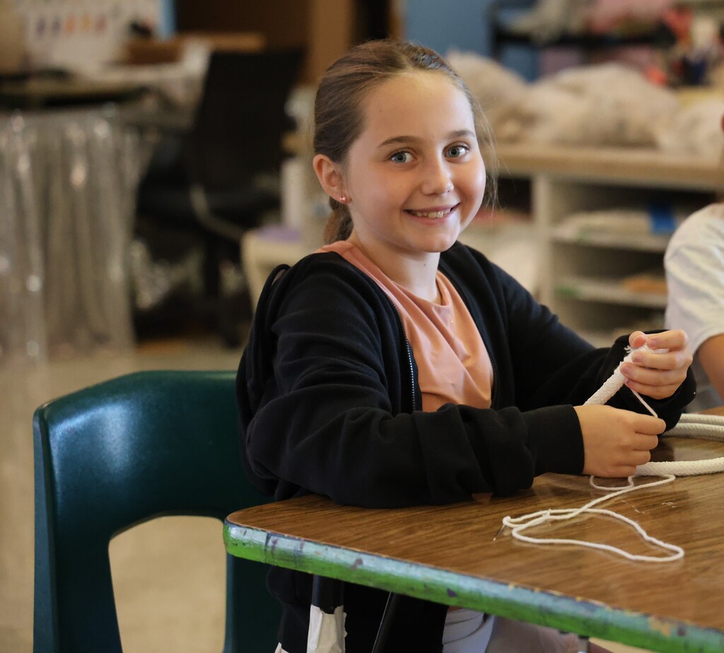 L.T. Ball fifth graders are learning how to weave a basket.