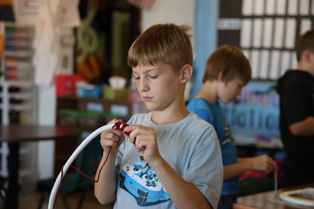 L.T. Ball fifth graders are learning how to weave a basket.