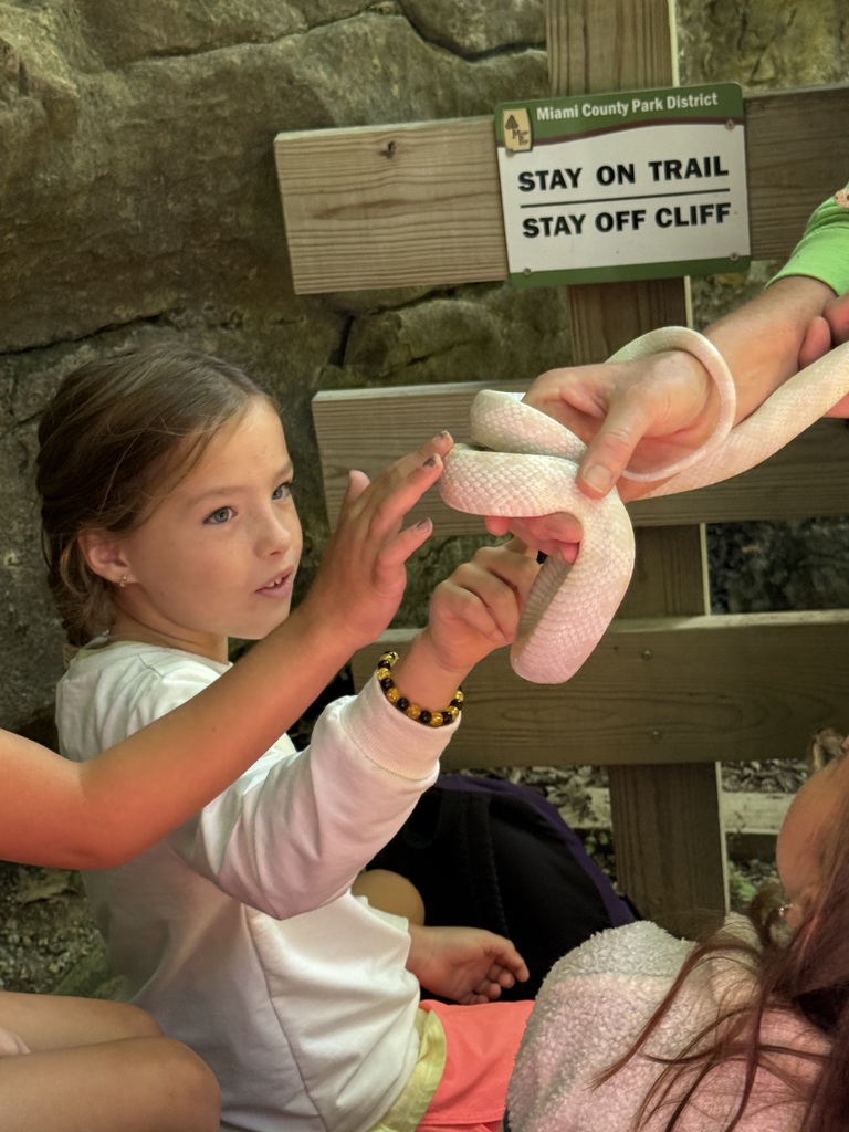 Second graders at Charleston Falls.  Students touch a snake.  