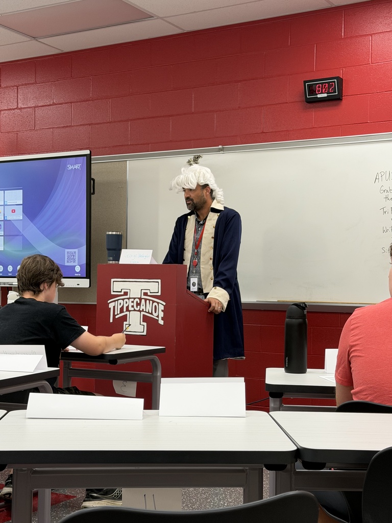 George Washington is at the podium with his delegates.  