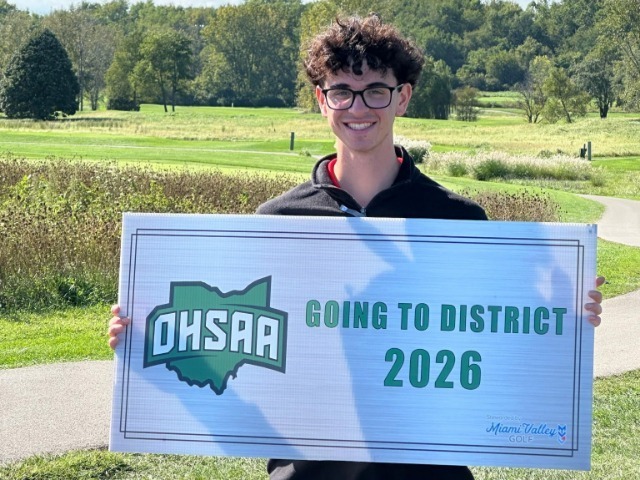 THS district bound student Grant Paulet holds his OHSAA sign.
