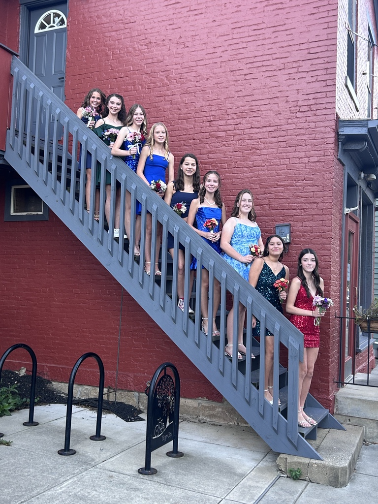A large group of THS girls pose on a set of stairs downtown before their homecoming.