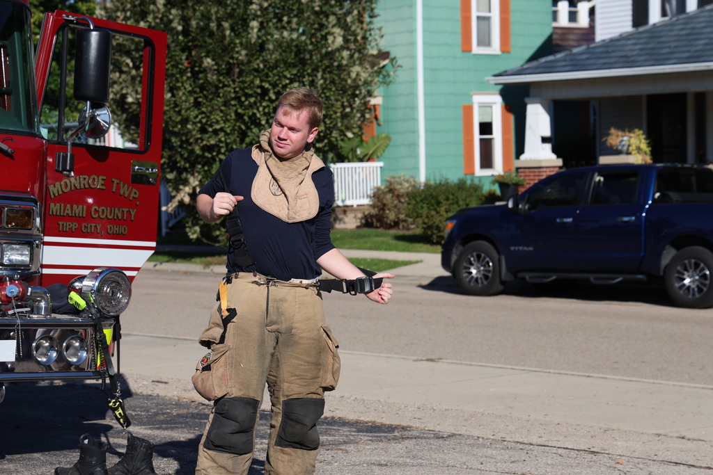 A firefighter explains he piece of protective clothing he puts on before heading out on a call.