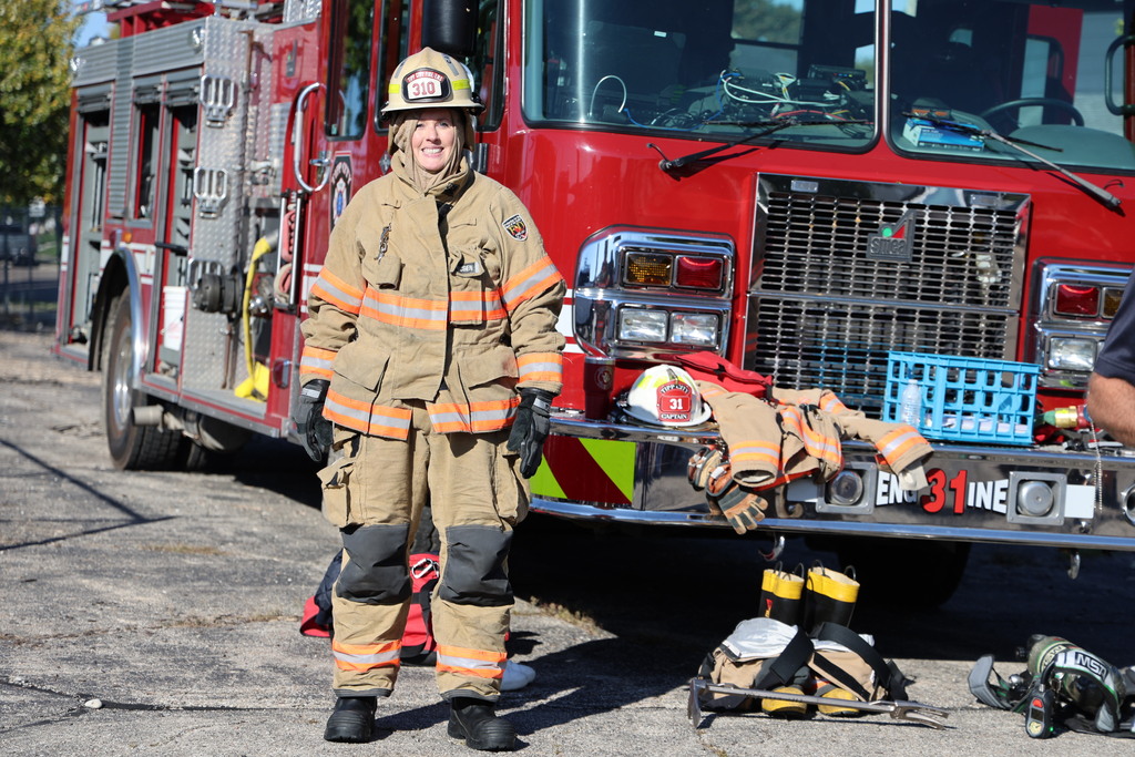 Mrs. Hamby smiles after getting on the gear.