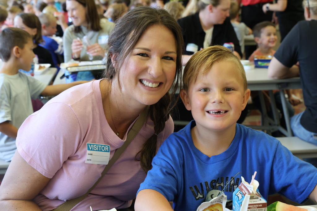 A mom and her son enjoy lunch at Broadway during National School Lunch Week.