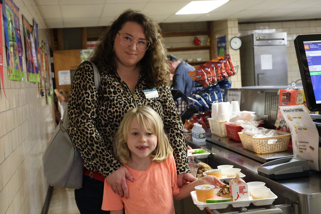 A mom and her daughter purchase lunch during National School Lunch Week.