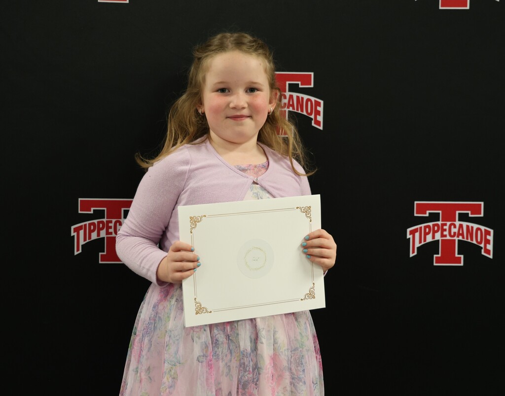 Board of Education honoree from Broadway Elementary holds her certificate.