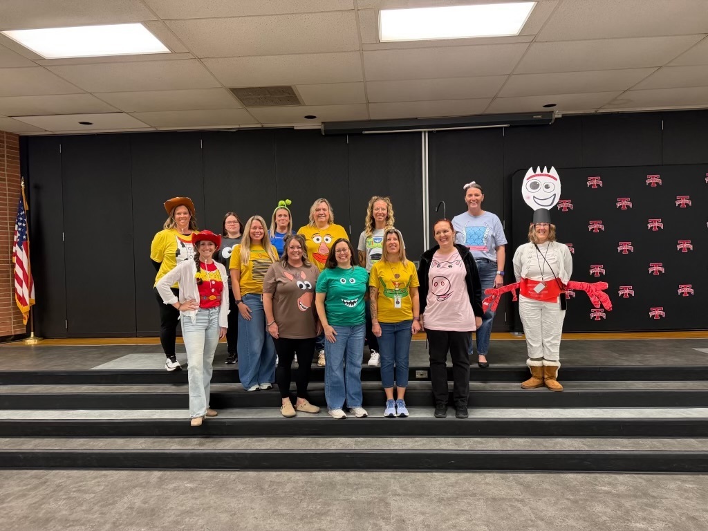 LT Ball staff dressed as Toy Story characters.