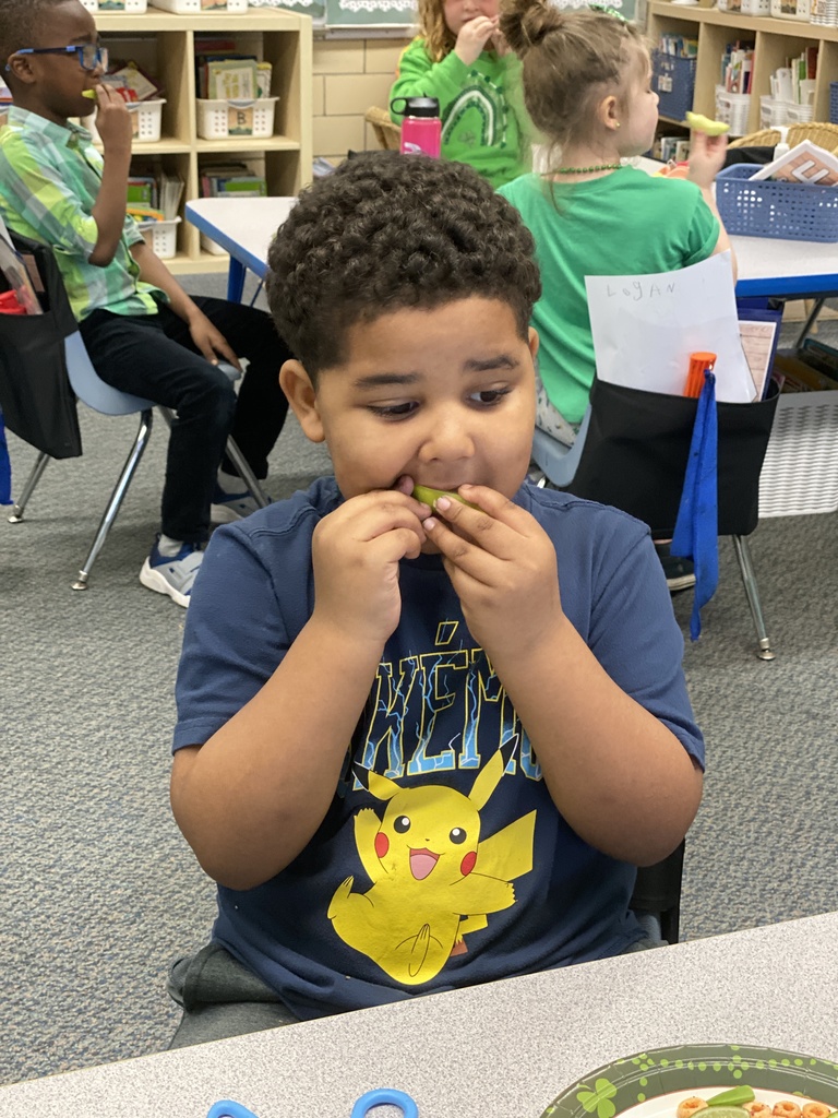 NA student sampling a new food.