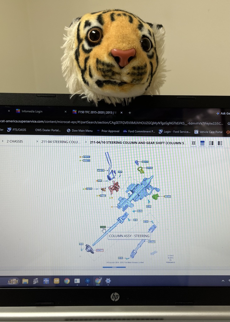 Tank with an instruction manual at Ford Dealership