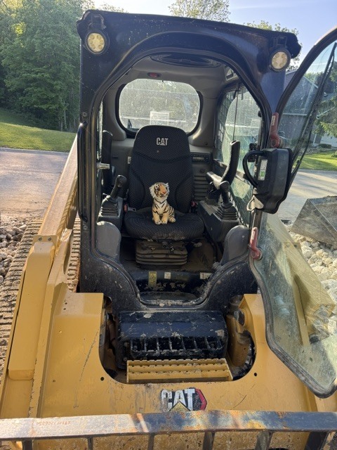 Tank operating a skid steer