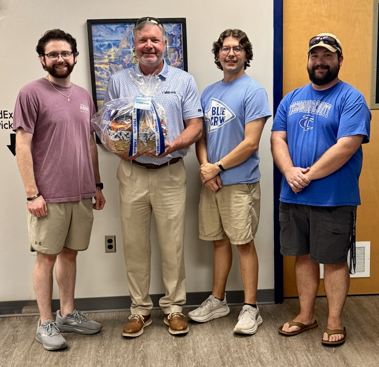 TCHS staff accepting gift from FMBank