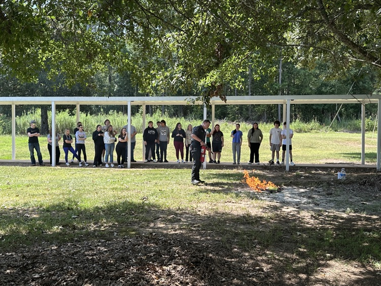 Lt. Jesse Gwin demonstrated fire extinguisher procedures.
