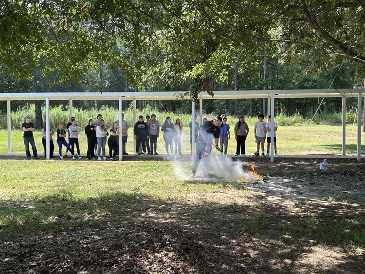 Lt. Jesse Gwin demonstrated fire extinguisher procedures.