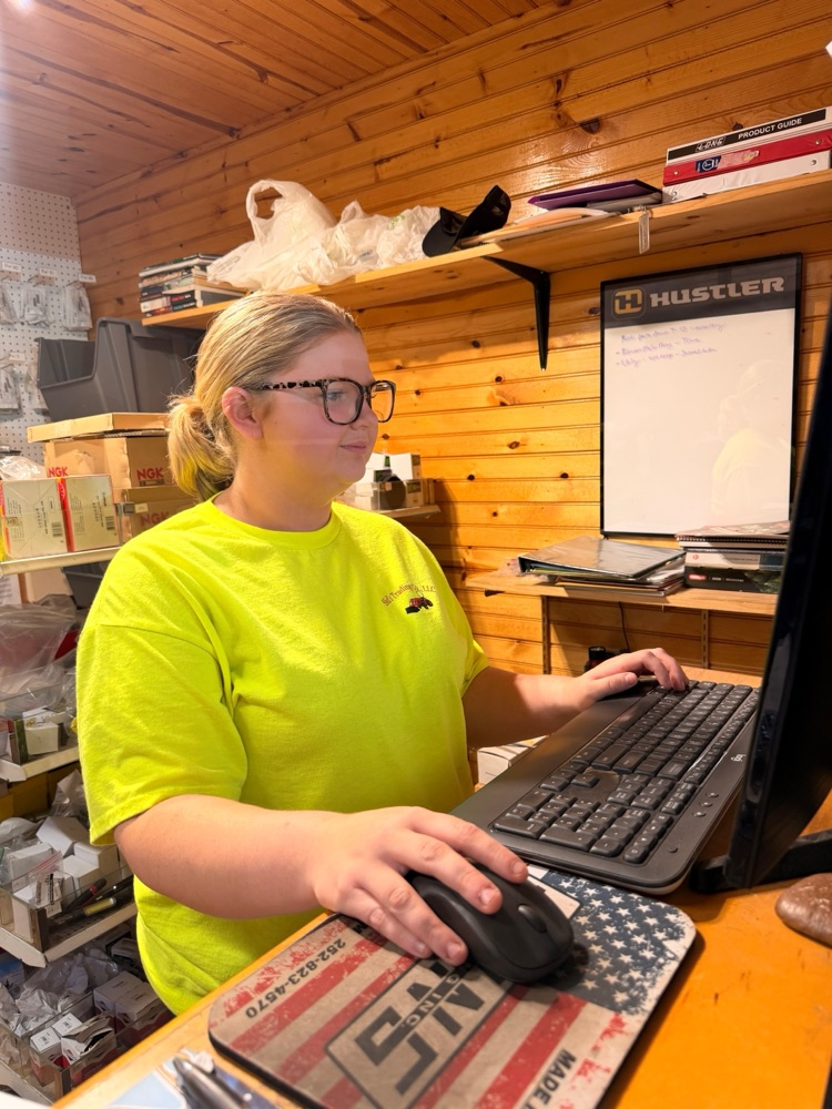 Josie Cox working at Sid’s Trading Co.