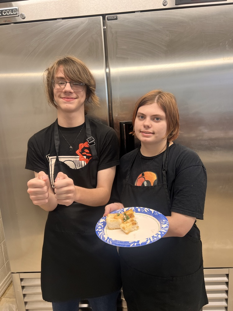 Students with their culinary dishes.
