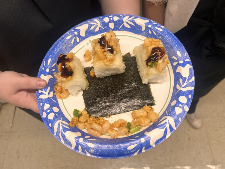 Students with their culinary dishes.