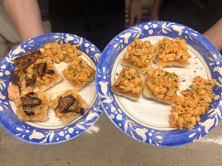 Students with their culinary dishes.