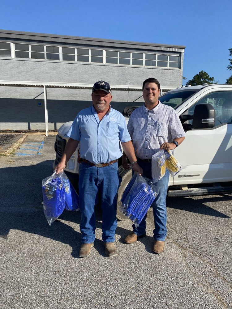 Timmy Anglin from PSP Industries drops off PPE for students. Also pictured is Welding Instructor Blake Cass