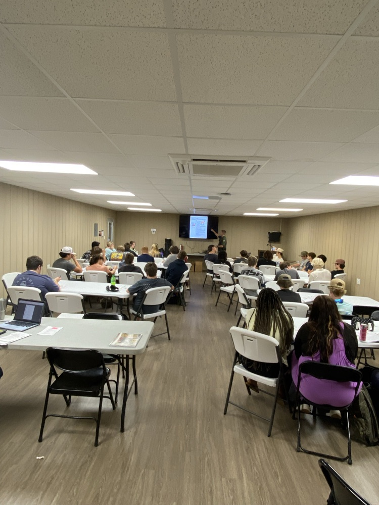 Game Warden Lane Young leading a safety course