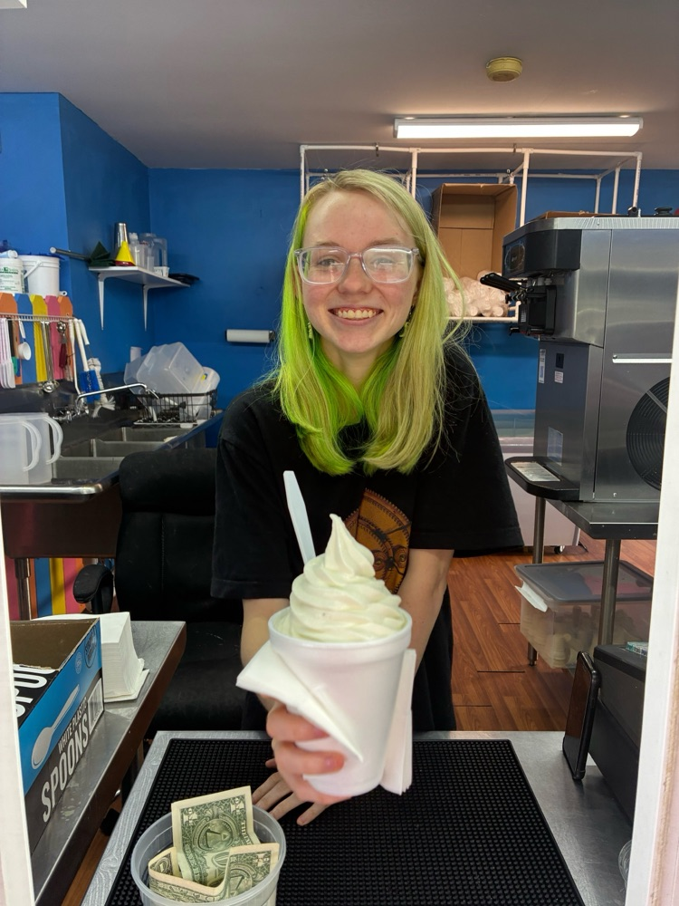 Chloe Gassaway serving up ice cream at the Tiger Shack