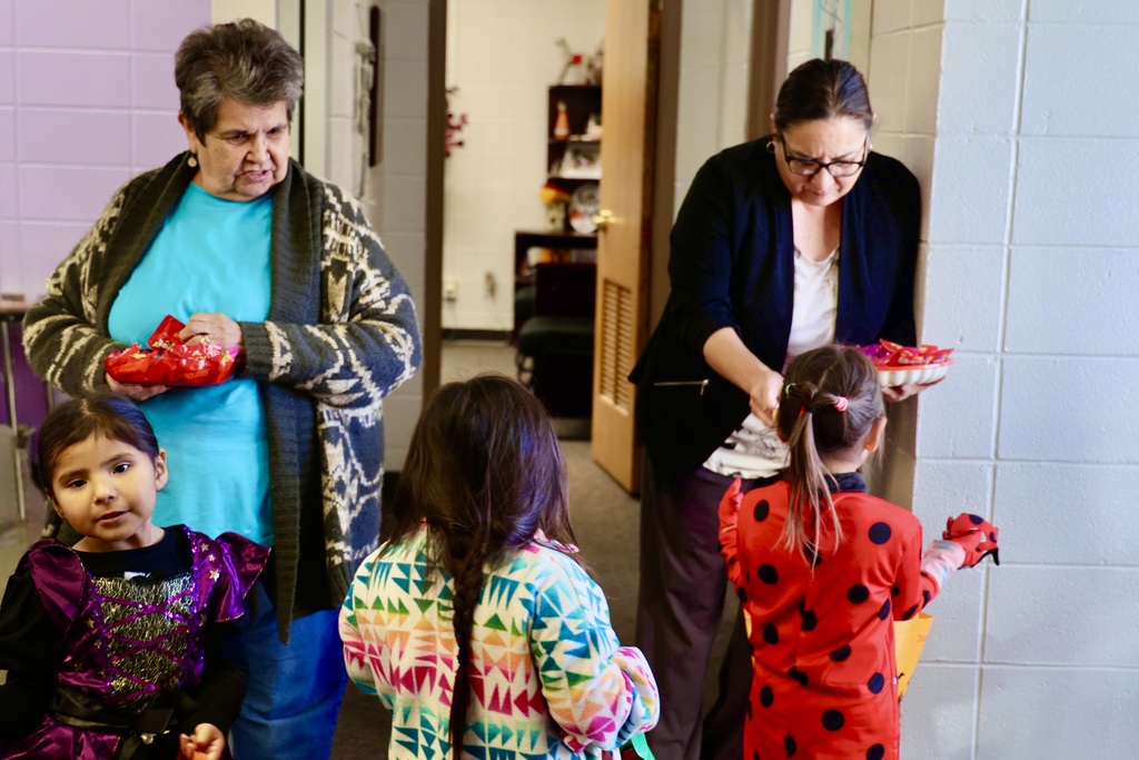 Rosie and Roberta handing out candy to the kids. 