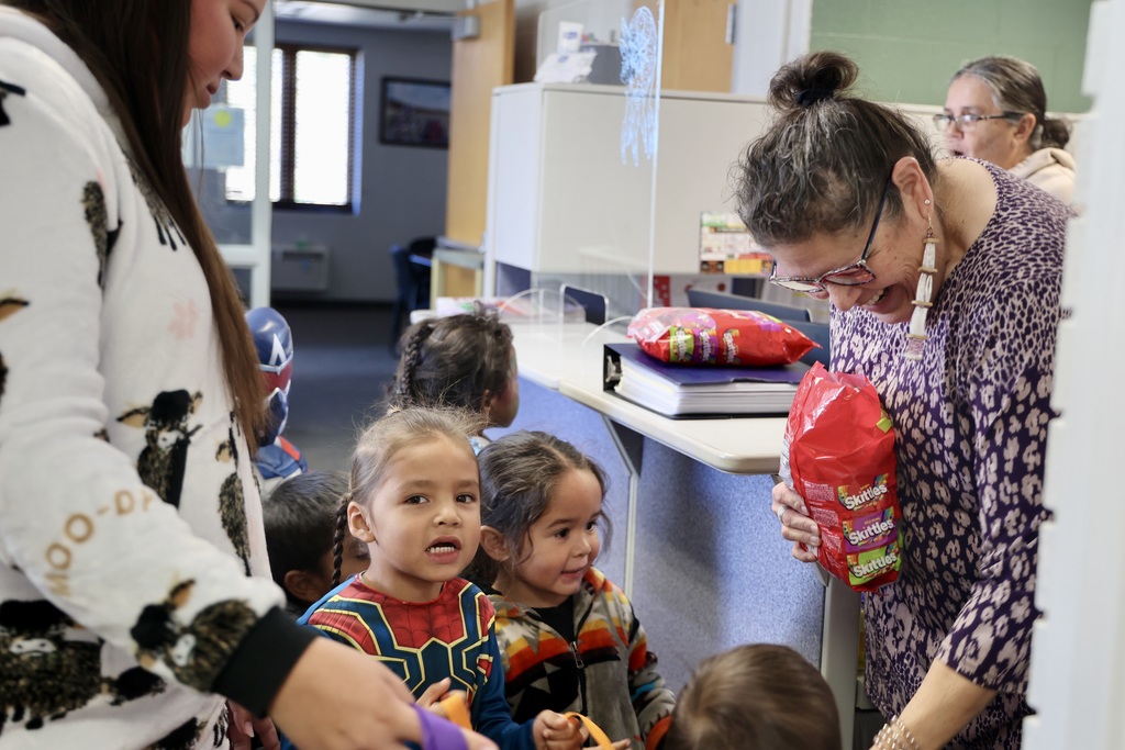 Deb handing them candy
