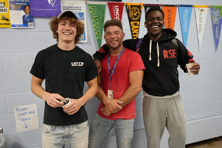 two students with auto body teacher