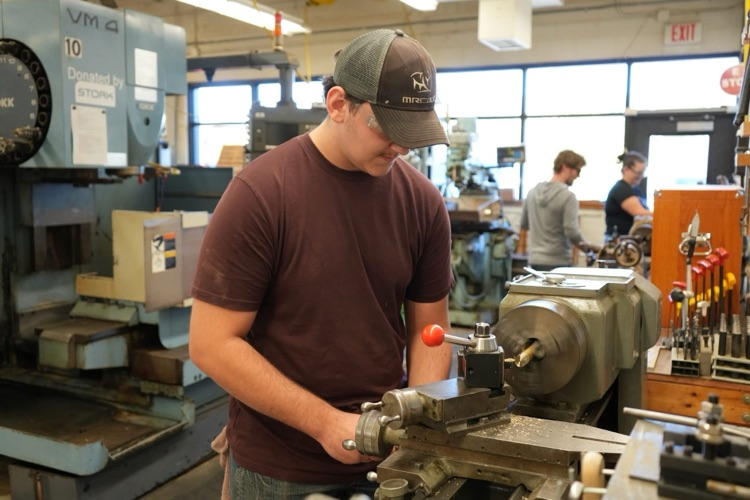student using mill