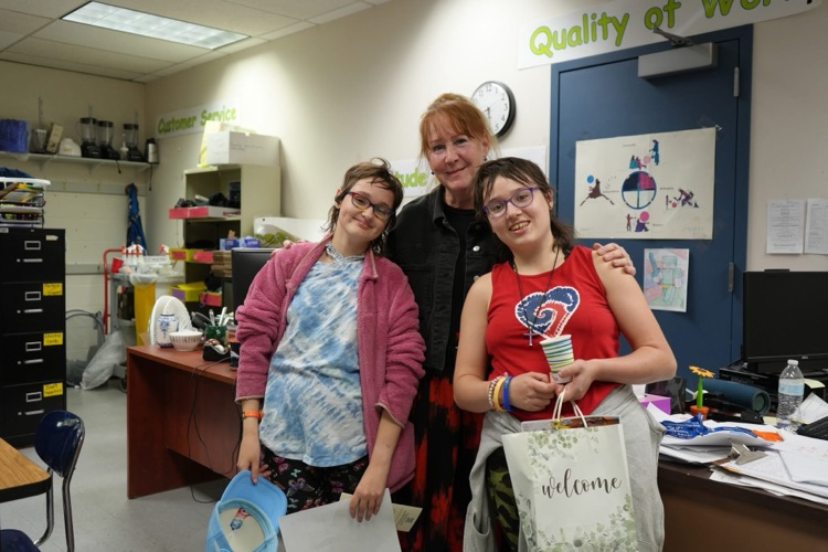 family with teacher at open house