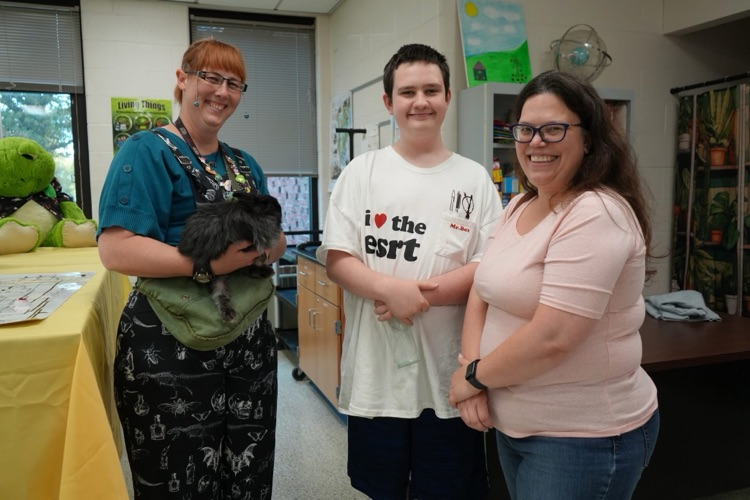student visiting turning point science
