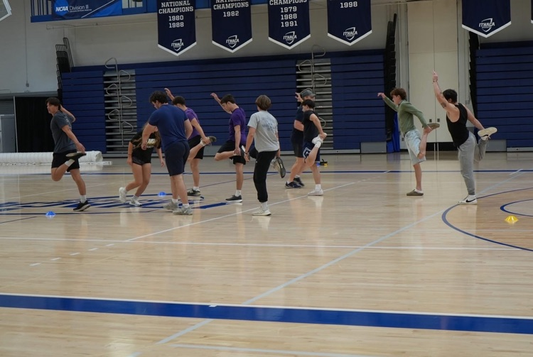 students running and warming up for agility test