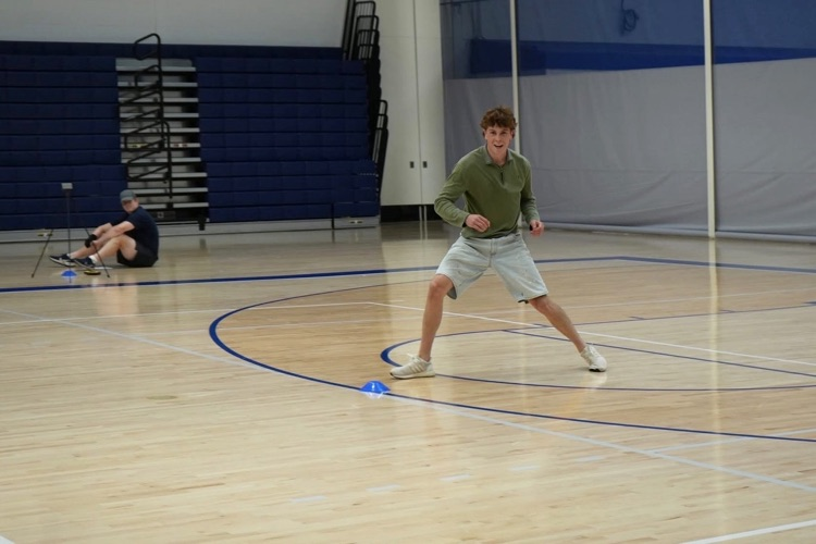 student running in agility test