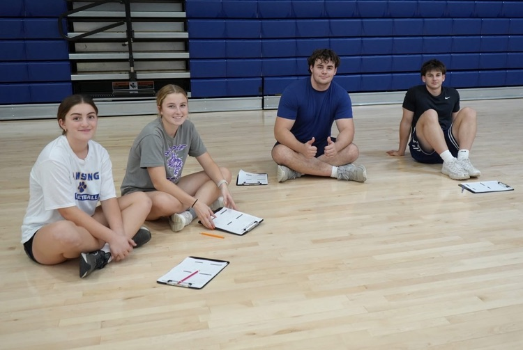 students marking their times in agility testing