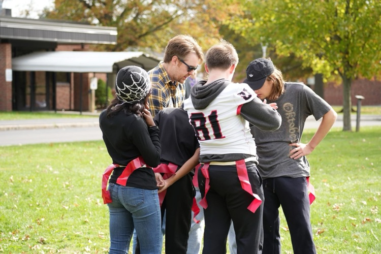 Pat’s team in huddle