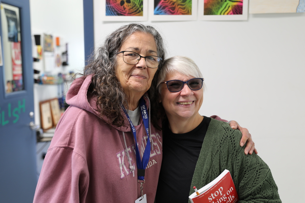 Two adults smiling for a photo