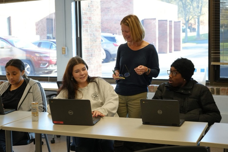 CTE school counselor helping students apply to college