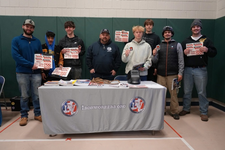 students at Pathways to your future fair with iron workers