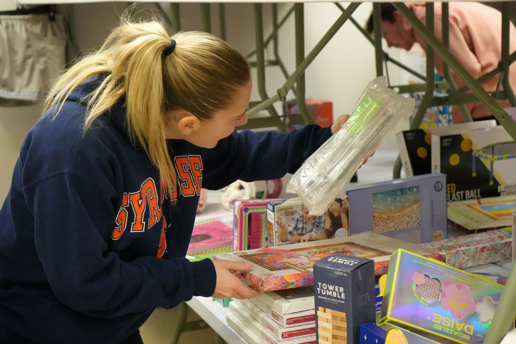 a student looking through potential gifts