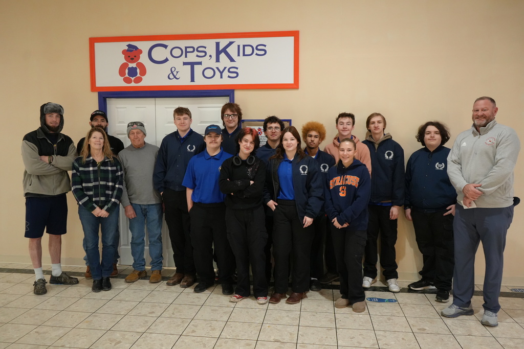 A group photo of students at Cops, Kids, and Toys